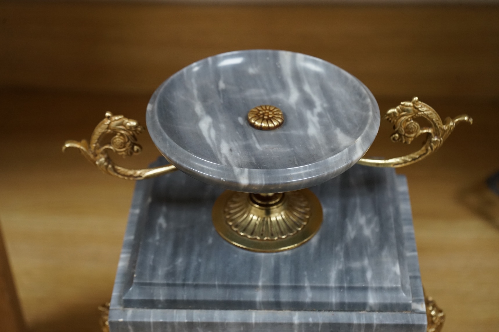 A French gilt metal mounted grey marble mantel clock, late 19th century, 35cm